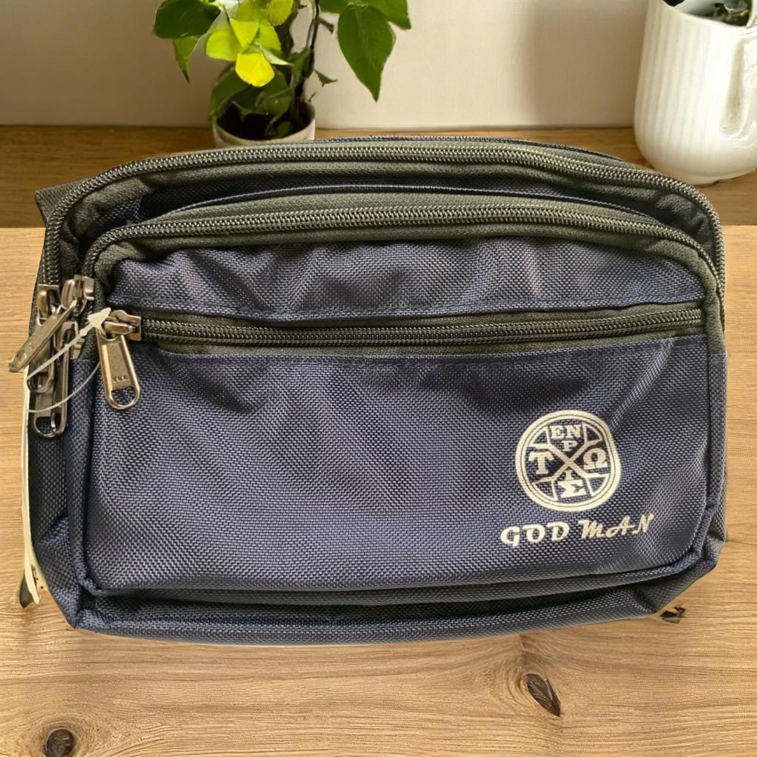 Multi-compartment waist pouch